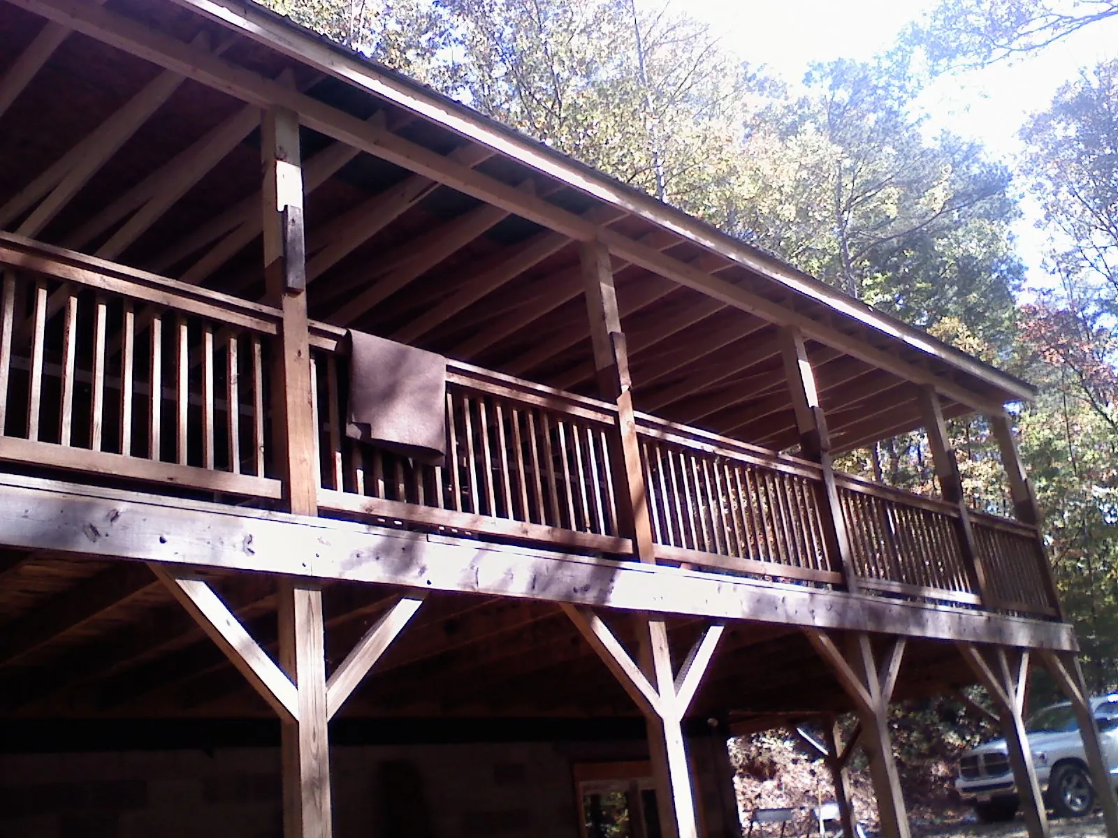Timber framing under a new elevated porch and deck — Roof Leak Repair in Green Springs by Roofing Brothers